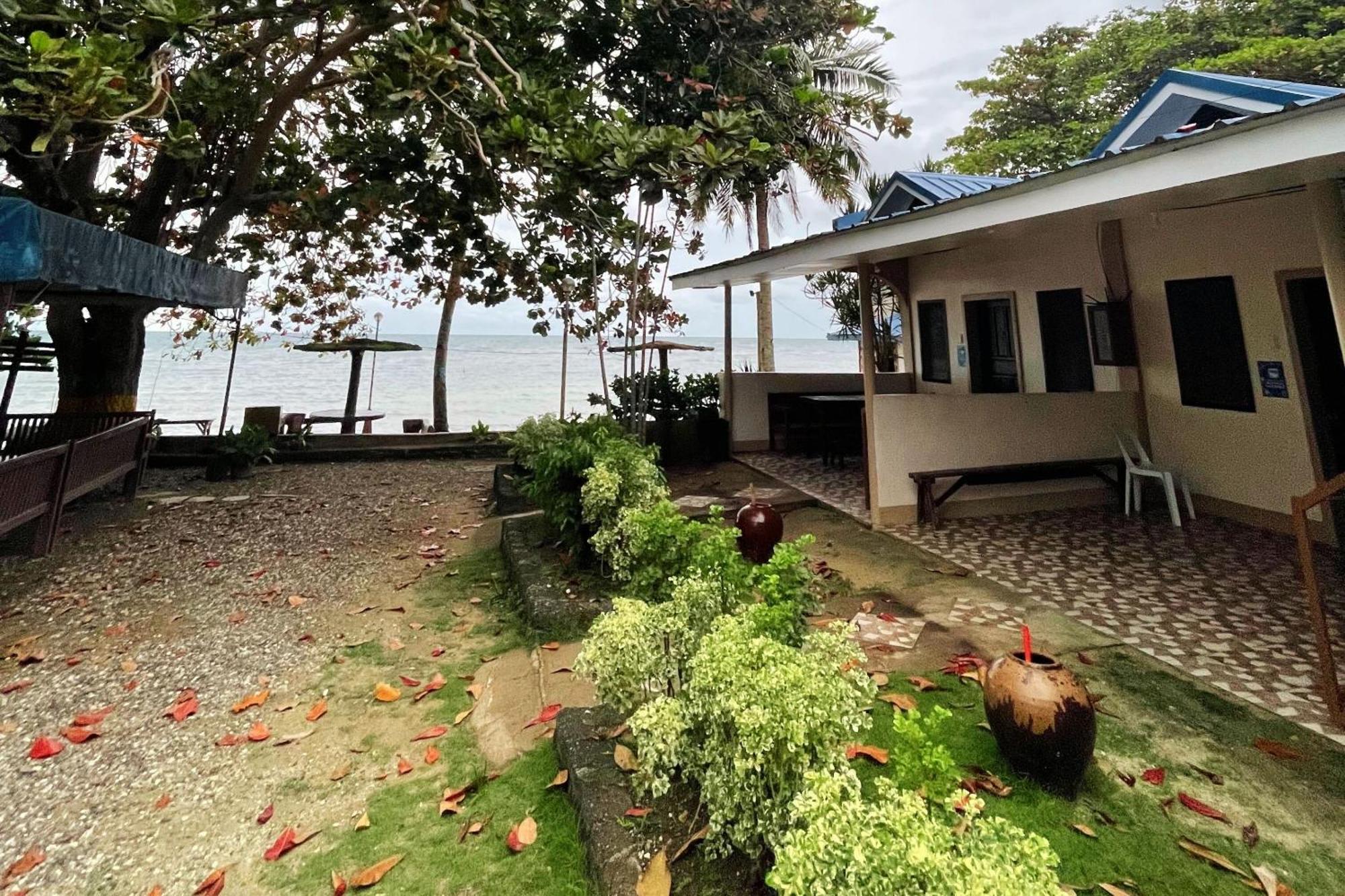 Durhan White Beach Resort Powered By Cocotel Tabuelan Exterior photo