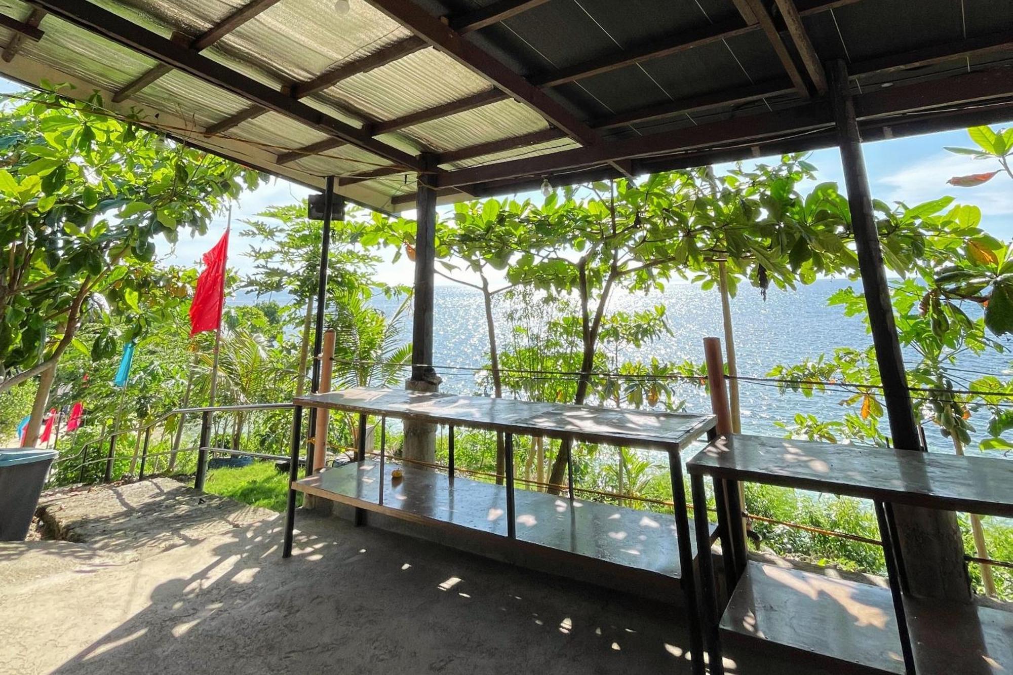 Durhan White Beach Resort Powered By Cocotel Tabuelan Exterior photo
